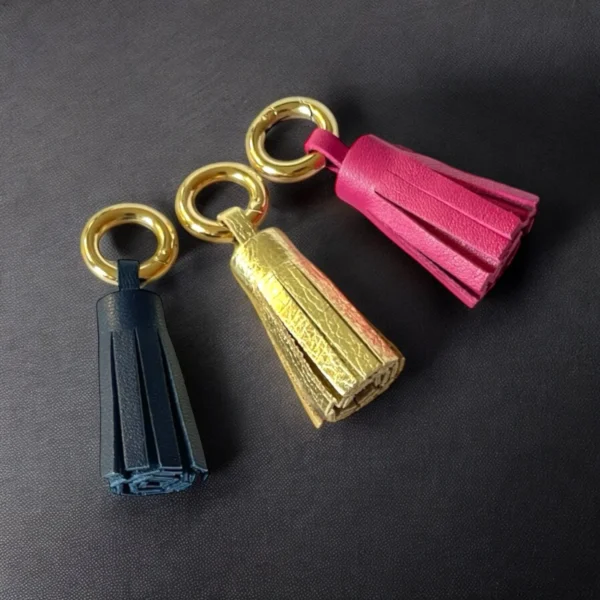 Porte-clés doré Pompon